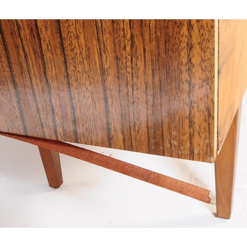 722 - Beautility - A mid 20th century Beautility veneer sideboard. The sideboard featuring a central bank ... 