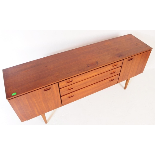 724 - Nathan Furniture - A mid 20th century Nathan Furniture teak wood sideboard credenza. The sideboard h... 