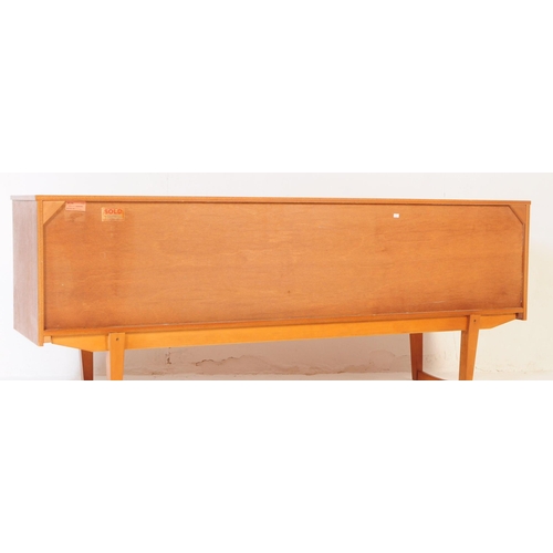 725 - Stonehill - A mid 20th century Stonehill teak wood sideboard credenza. The sideboard having two cupb... 