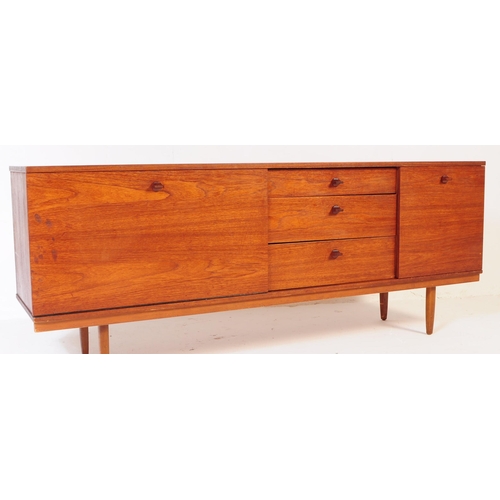 726 - Avalon - A mid 20th century Avalon teak wood sideboard credenza. The sideboard having a long drop do... 