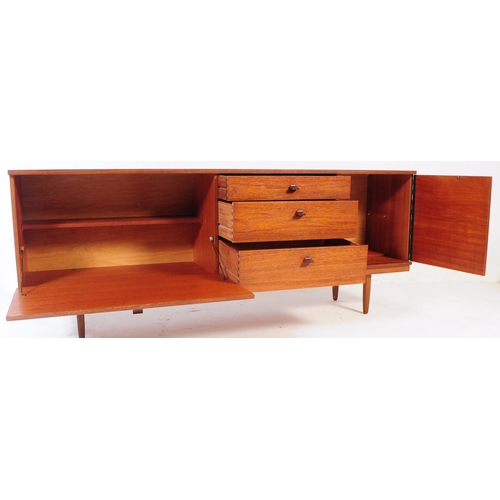 726 - Avalon - A mid 20th century Avalon teak wood sideboard credenza. The sideboard having a long drop do... 