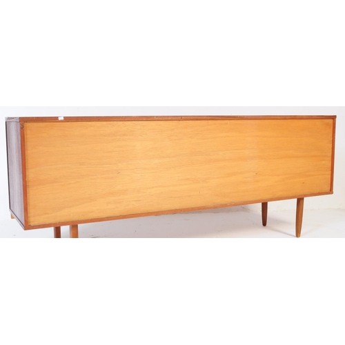 726 - Avalon - A mid 20th century Avalon teak wood sideboard credenza. The sideboard having a long drop do... 