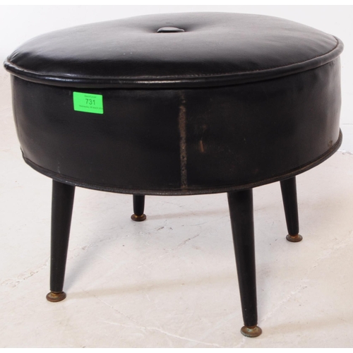 731 - Sherbourne - A mid 20th century circa. 1970s Sherbourne vinyl pouffe footstool. The footstool having... 