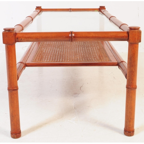 734 - G-Plan - A mid 20th century G Plan teak wood and rattan bamboo effect coffee table. The coffee table... 