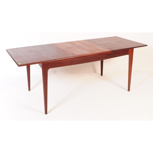 737 - Younger Fonseca - A mid 20th century Younger Fonseca range teak wood draw leaf extending dining tabl... 