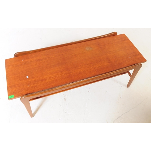 743 - British Modern Design - Vintage mid 20th century teak coffee table. Rectangular form with plank top,... 