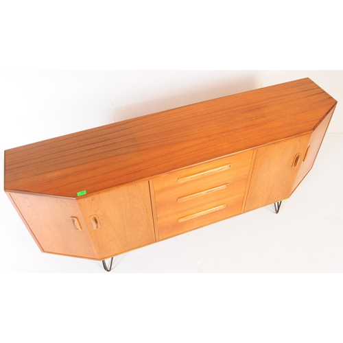 745 - G Plan Furniture - A British retro mid 20th century teak sideboard. Of rectangular form with a bank ... 