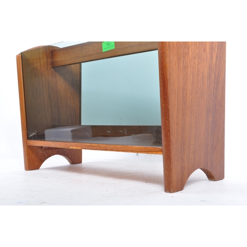 765 - A retro 1970s century teak wood & smoked glass magazine rack. Rectangular form with smoked glass ins... 