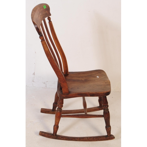 770 - A 19th century Victorian beech and elm Windsor nursing rocking chair. Having a curved top with flat ... 