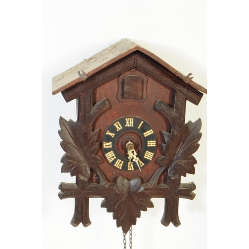 771 - Two mid century Black Forest German Bavarian wall hanging cuckoo clocks. Both having a carved detail... 