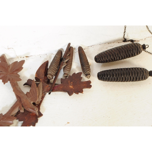 771 - Two mid century Black Forest German Bavarian wall hanging cuckoo clocks. Both having a carved detail... 