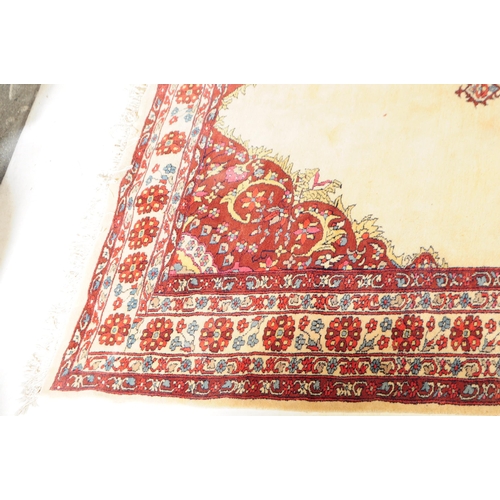 773 - A 20th century central Persian Sarouk manner carpet floor rug. The rug having a cream ground with la... 