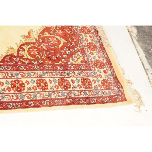 773 - A 20th century central Persian Sarouk manner carpet floor rug. The rug having a cream ground with la... 