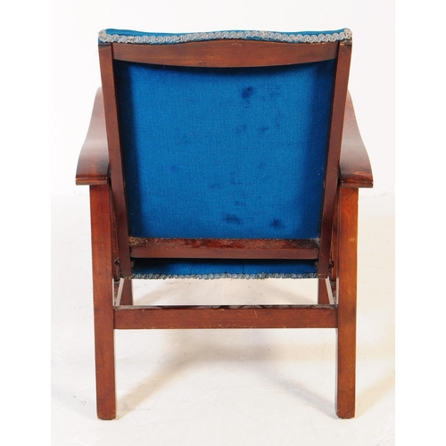 778 - 1930s Art Deco oak frame upholstered children's armchair. Shaped arms with oak elbow rests and blue ... 