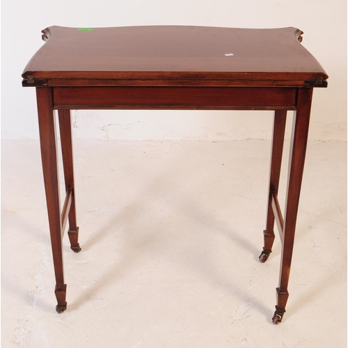 779 - Edwardian early 20th century mahogany fold over games card table. The table being raised on tapering... 