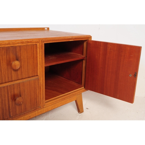 781 - Meredew Furniture - A vintage 20th century teak wood chest sideboard credenza. Of rectangular shape ... 