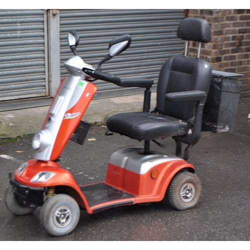 792 - Kymco - Foru - An orange contemporary mobility scooter. Having an orange and silver colourway with f... 