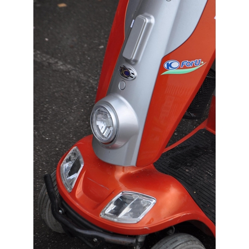 792 - Kymco - Foru - An orange contemporary mobility scooter. Having an orange and silver colourway with f... 