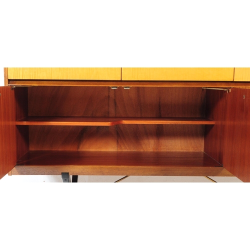 699 - Wrighton - A vintage mid 20th century circa 1960s teak and satinwood Wrighton sideboard credenza. Th... 