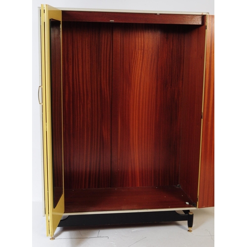 700 - E-Gomme - A mid 20th century G Plan E-Gomme formica and wood wardrobe and dressing table. The wardro... 