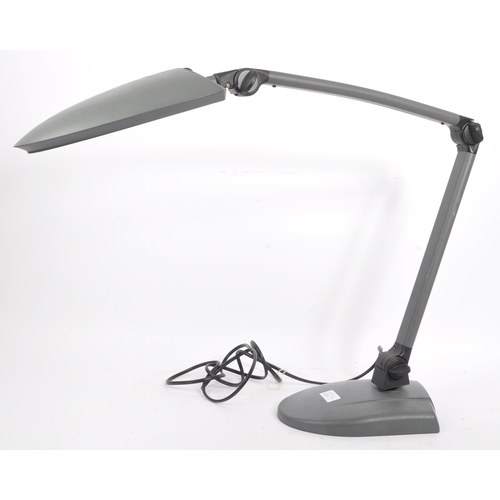 749 - A vintage 20th Century 1990s articulated desk lamp light having grey plastic shade supported by an a... 