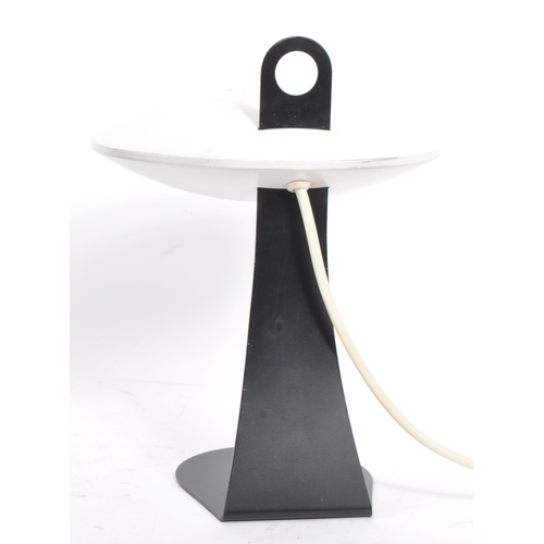 750 - A retro 1980's aluminium 'mushroom' table desk lamp. Having an off white aluminium shade, with eboni... 