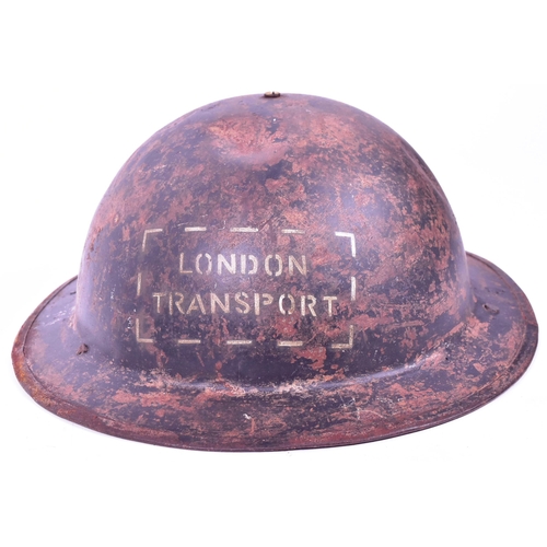 114 - A WWII Second World War British Home Front London Transport Brodie helmet with white painted letteri... 