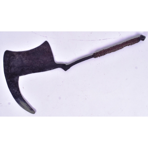 132 - An early 20th Century Kirdi People ( Cameroon ) axe. Stylized iron head with a woven leather grip. M... 