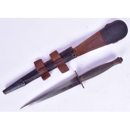 145 - An original 3rd pattern FS Fairbairn Sykes British Commando dagger. Raised disk shaped pommel etched... 