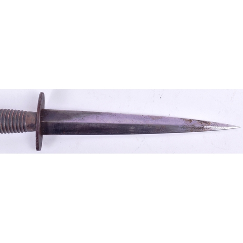 145 - An original 3rd pattern FS Fairbairn Sykes British Commando dagger. Raised disk shaped pommel etched... 