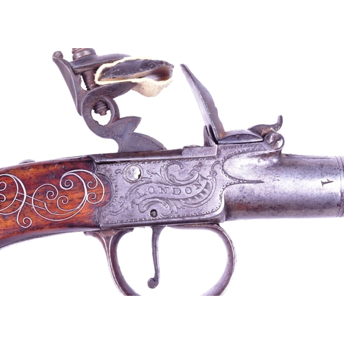 155 - An 18th Century Joiner of London made flintlock pocket / muff pistol. Cannon barrel, foliate engrave... 