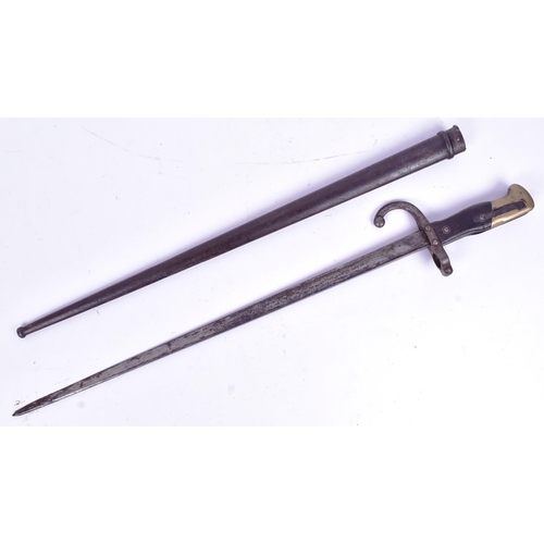 159 - An original 19th Century French 1881 pattern Gras rifle bayonet. The hilt with brass pommel and wood... 