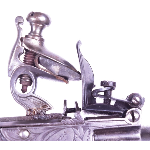 16 - A 19th Century John Jones & Son flintlock pistol. Turn-off barrel, foliate engraved lock plate, work... 