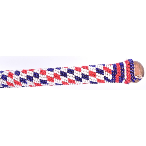 166 - A WWI First World War Officers walking cane decorated in Turkish red white and blue beadwork. Measur... 