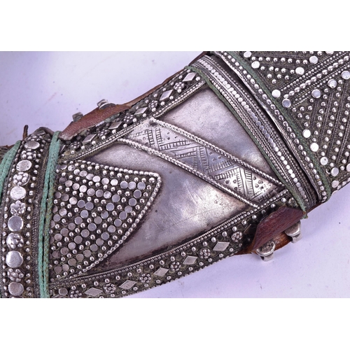 17 - A 19th Century Kenyan / (Taiz) Jambiya / Khanjar dagger. Horn grip with applied white metal filigree... 