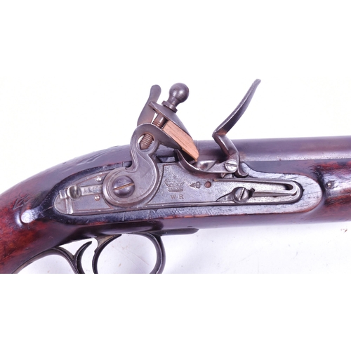 18 - An early 18th Century William IV circa 1830 New Land Pattern flintlock pistol. Brass mounted full wa... 