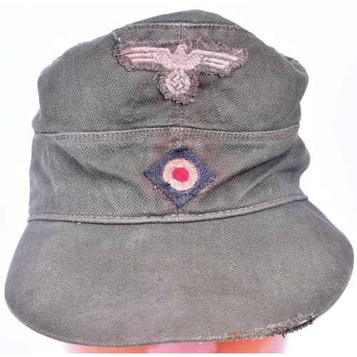 184 - A WWII Second World War Third Reich Nazi German Afrika Korps M41 field cap. Khaki with stitched Eagl... 