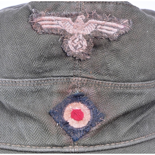 184 - A WWII Second World War Third Reich Nazi German Afrika Korps M41 field cap. Khaki with stitched Eagl... 