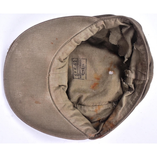 184 - A WWII Second World War Third Reich Nazi German Afrika Korps M41 field cap. Khaki with stitched Eagl... 