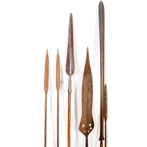 196 - A collection of x11 early African tribal / hunting spears. Forged iron tips, wooden shafts, some dou... 