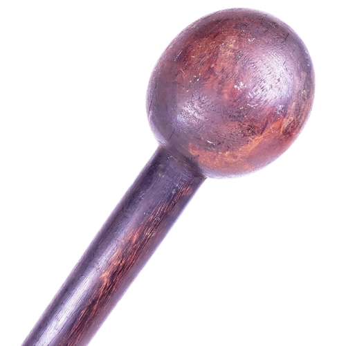 209 - A mid 20th Century South African Zulu tribal club / Knobkerrie club. Globular shaped club head mount... 