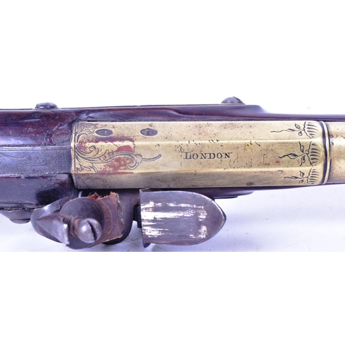 21 - An 18th Century Moore of London made flintlock brass barrelled blunderbuss pistol. The lock plate fa... 