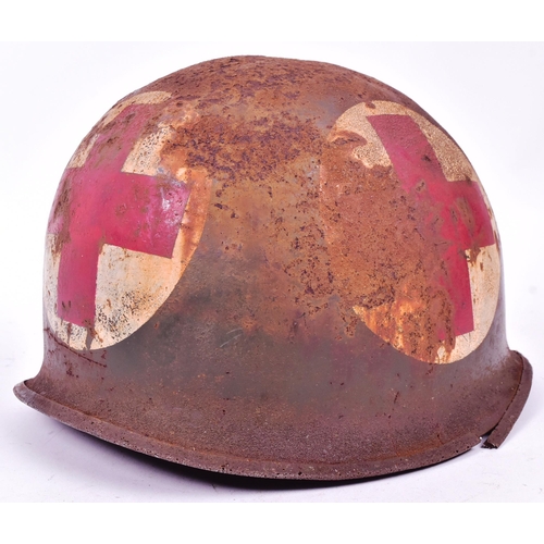 210 - An original WWII Second World War US United States Army M1 Medics helmet. Steel outer shell with swi... 