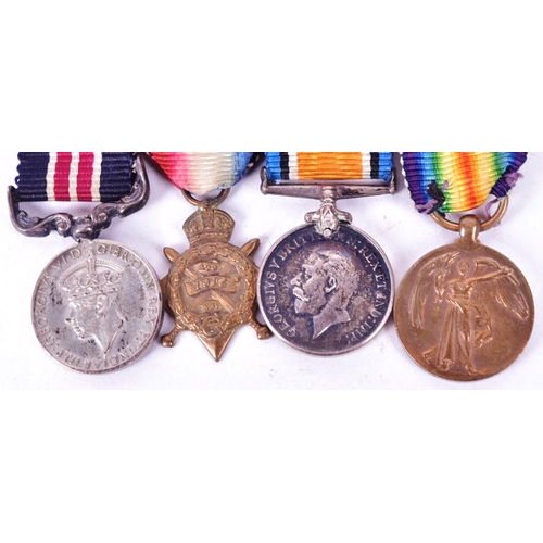 217 - A WWI First World War miniature medal group comprising Victory medal, British War medal, 1914 / Mons... 