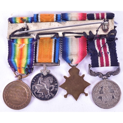 217 - A WWI First World War miniature medal group comprising Victory medal, British War medal, 1914 / Mons... 