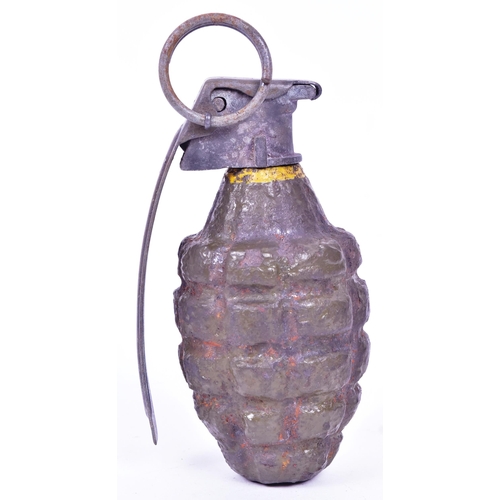 218 - A WWII Second World War US United States Pineapple Grenade. Dummy fuze with spring and striker plate... 