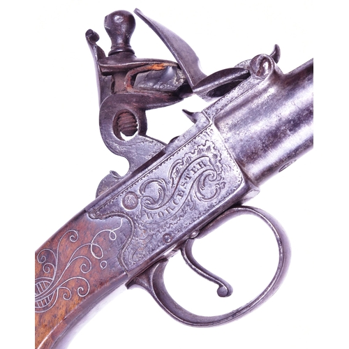 22 - An 18th Century T Smith of Worcester made flintlock pocket pistol. Cannon barrel, foliate engraved l... 