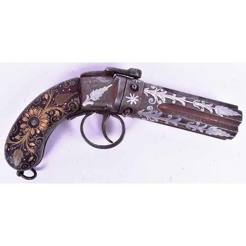 23 - An early 20th Century Indian Pepper Box Pistol / multi barrel revolver. The butt inlaid with brass s... 