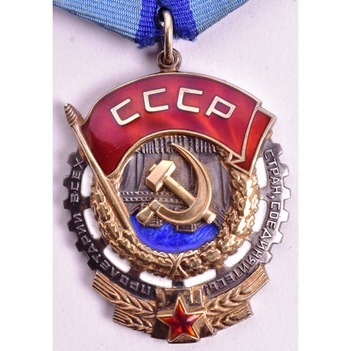 239 - A WWII Second World War Soviet Russian Union Order of the Red Banner of Labour medal. The medal in a... 