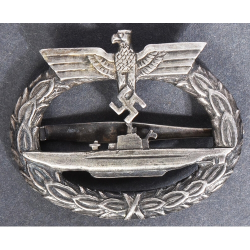 245 - A WWII Second World War Third Reich Nazi German Kriegsmarine U-Boat War badge. The badge having a wr... 